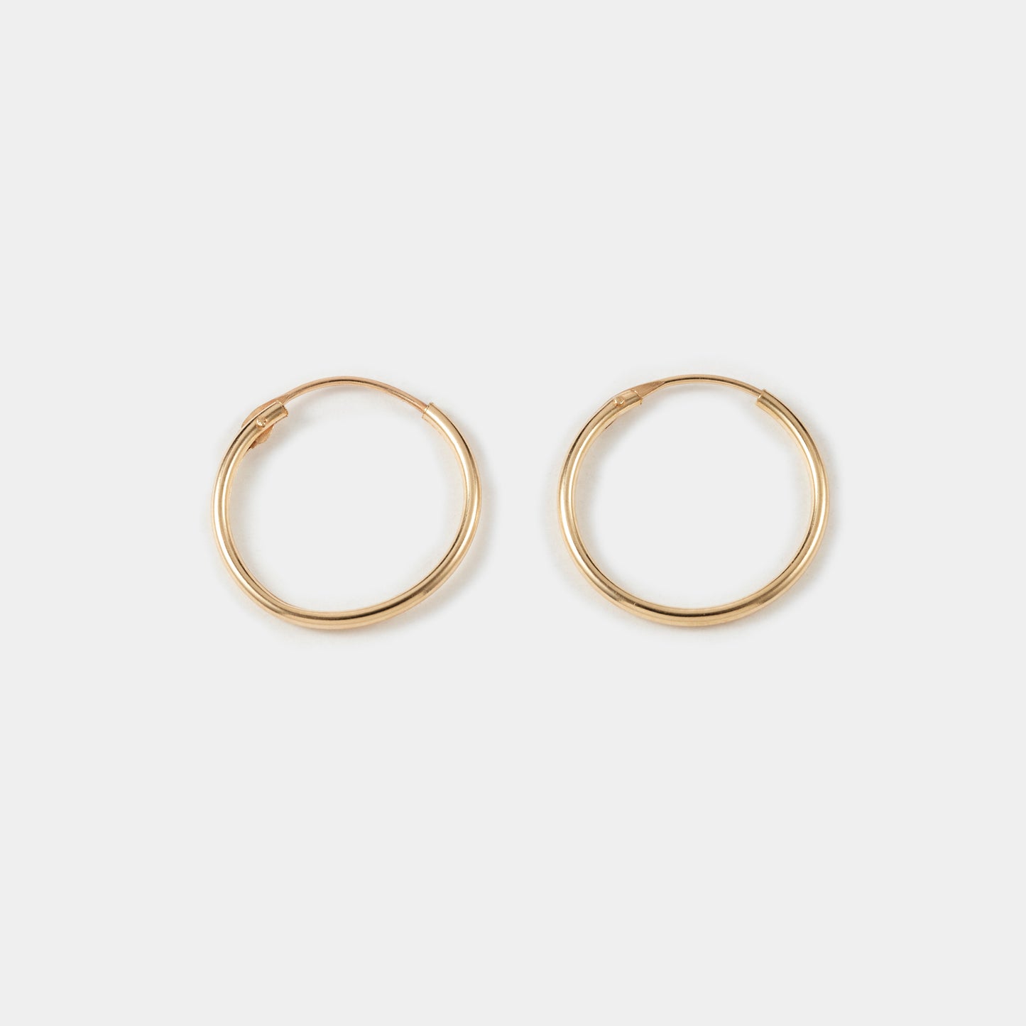 9K MINIMAL HOOP PIERCE