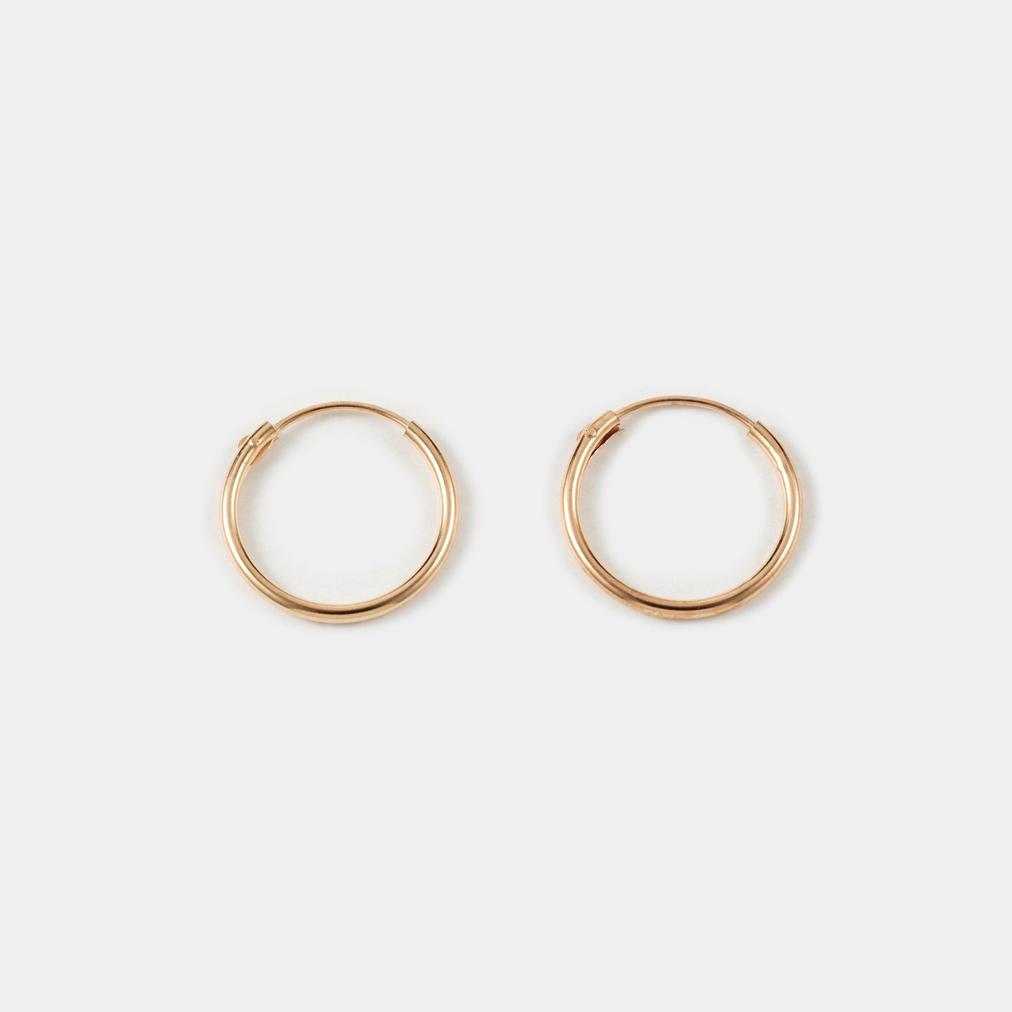 9K MINIMAL HOOP PIERCE