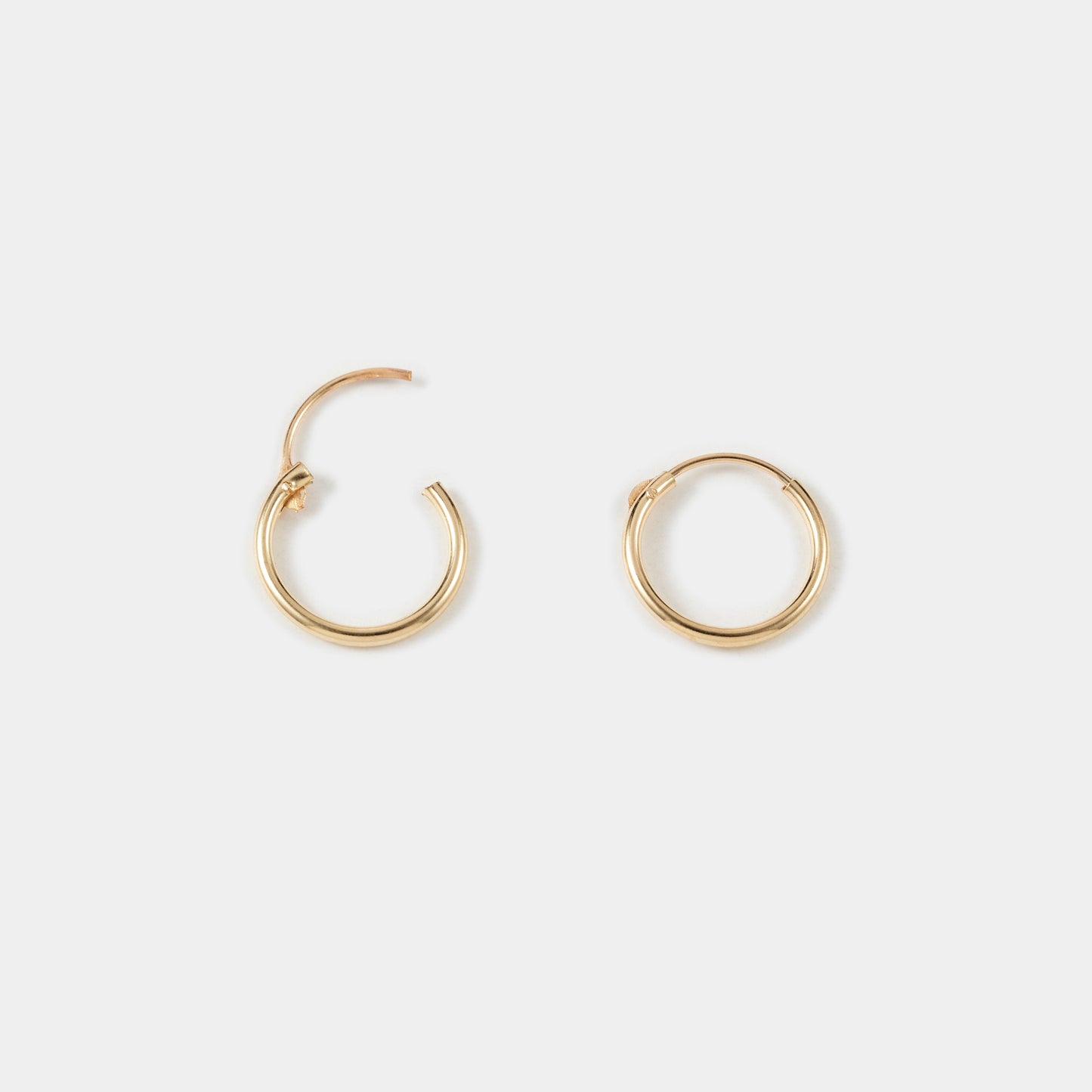 9K MINIMAL HOOP PIERCE